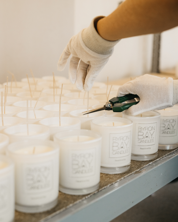 Preparing Byron Bay Candles by hand in the factory